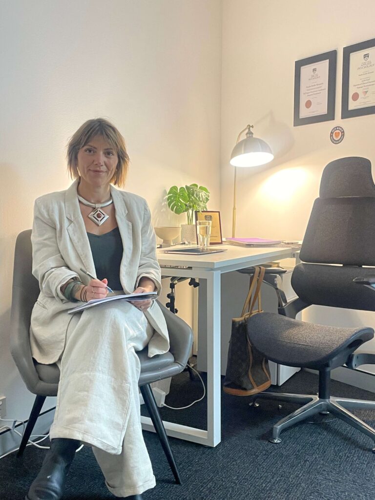 Sandra Moscardo seated in her consulting room at Inspire Cowork Miranda.